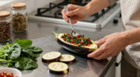 Sami Tamimi’s recipes for aubergine dolma bake with a spicy herb and spinach salad